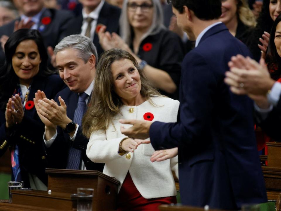 Canada's Deputy Prime Minister and Minister of Finance Chrystia Freeland is congratulated after delivering the fall economic statement in the House of Commons on Parliament Hill in Ottawa