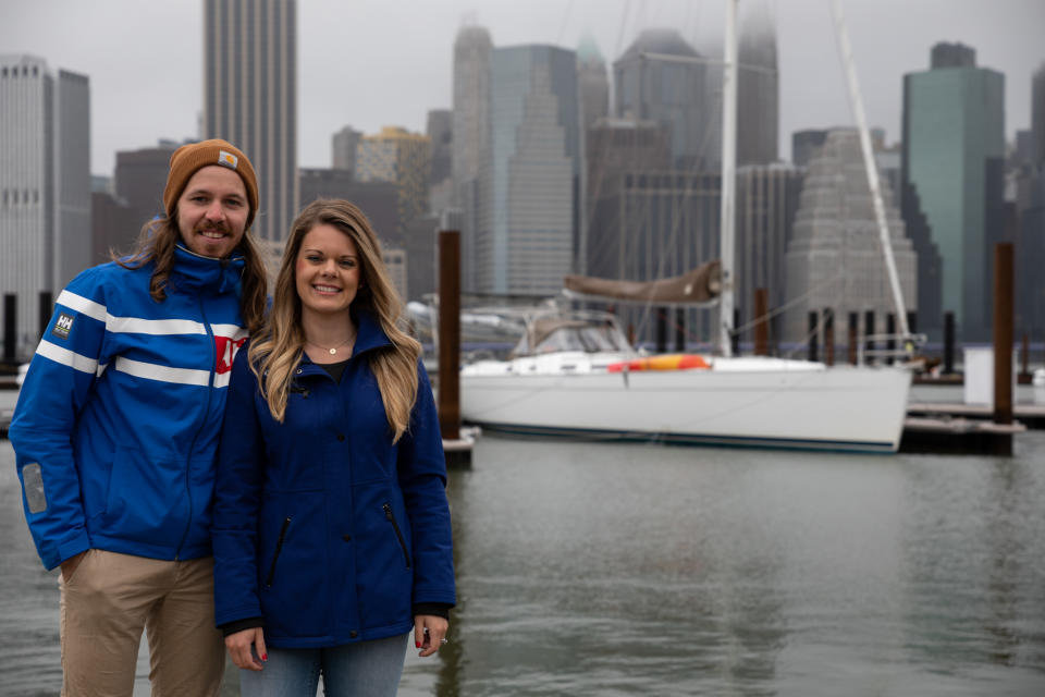 Rachel & Taylor Hartley with their boat at ONE15 Brooklyn Marina