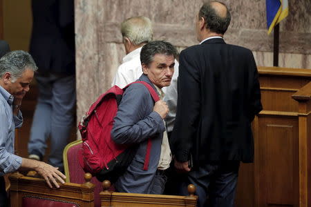 Greek Finance Minister Euclid Tsakalotos leaves following a parliamentary session in Athens, Greece July 16, 2015. REUTERS/Alkis Konstantinidis