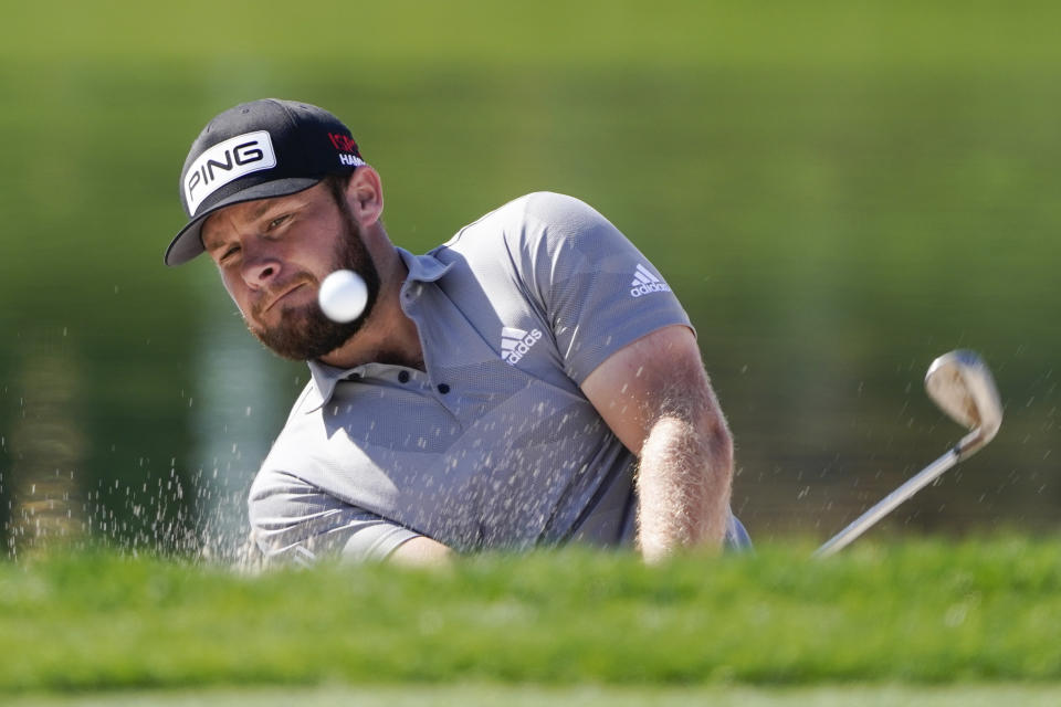Tyrrell Hatton, of England, hits from a trap on the 17th hole during the second round of the Arnold Palmer Invitational golf tournament Friday, March 4, 2022, in Orlando, Fla. (AP Photo/John Raoux)