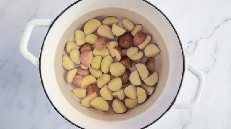 potatoes in dutch oven with water