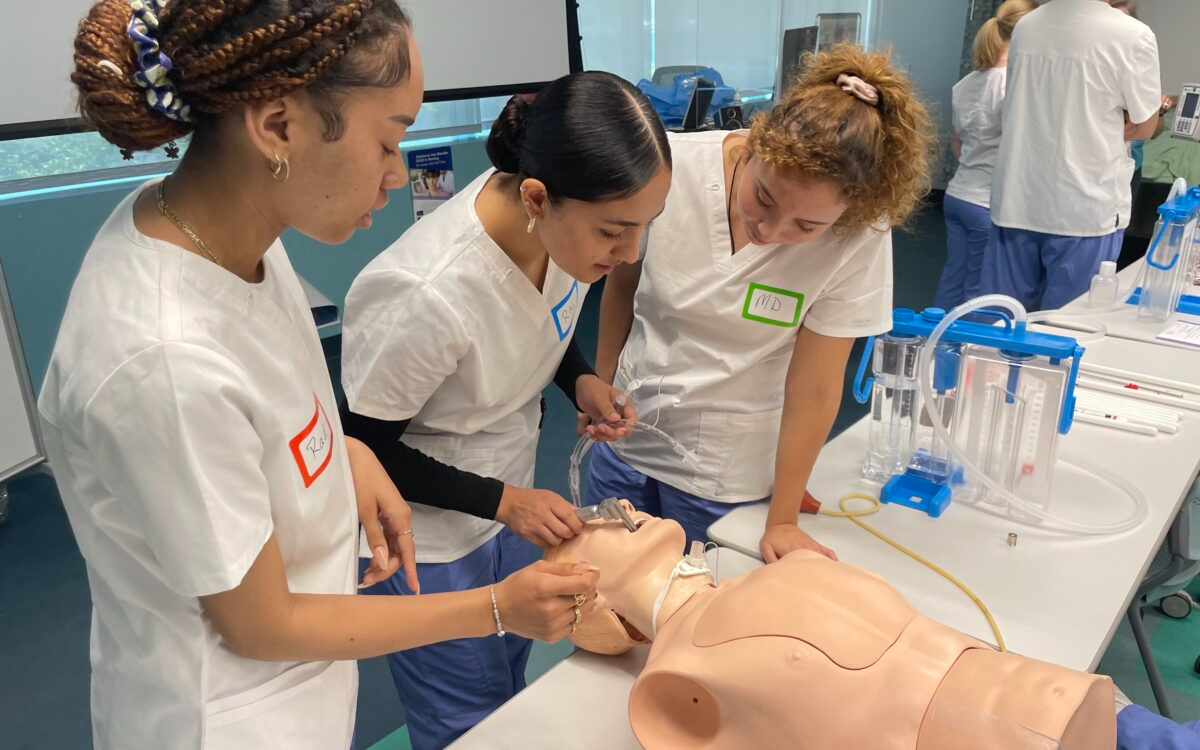 Students in Eastside High School's Biomedical Academy participate in a health care simulation.