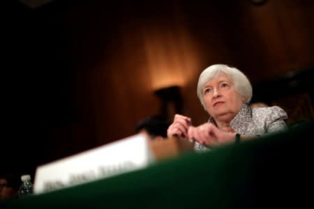 FILE PHOTO: Federal Reserve Chair Janet Yellen testifies before a Senate Banking Committee hearing on the 'Semiannual Monetary Policy Report to the Congress' on Capitol Hill in Washington, U.S. July 13, 2017. REUTERS/Carlos Barria/File Photo