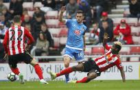 <p>AFC Bournemouth’s Lewis Cook, center, and Sunderland’s Didier Ibrahim Ndong battle for the ball </p>