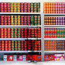 The 38-year-old Chinese-born artist hides out amongst some tin cans in 2010.
