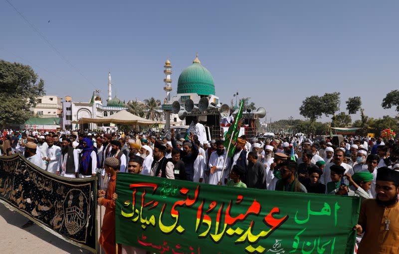 People protest against the cartoon publications of Prophet Mohammad in France during a rally to mark the birth anniversary of Prophet Mohammad, in Karachi