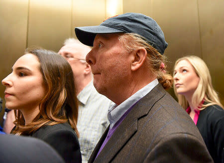 Celebrity chef Mario Batali arrives at court to face a charge of indecent assault and battery in Boston, Massachusetts, U.S. May 23, 2019. REUTERS/Faith Ninivaggi