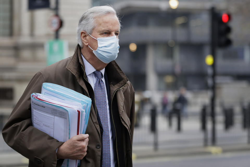 EU Chief Negotiator Michel Barnier walks to a conference centre in Westminster in London, Sunday, Nov. 29, 2020. Teams from Britain and the European Union are continuing face-to-face talks on a post-Brexit trade deal in the little remaining time. (AP Photo/Kirsty Wigglesworth)