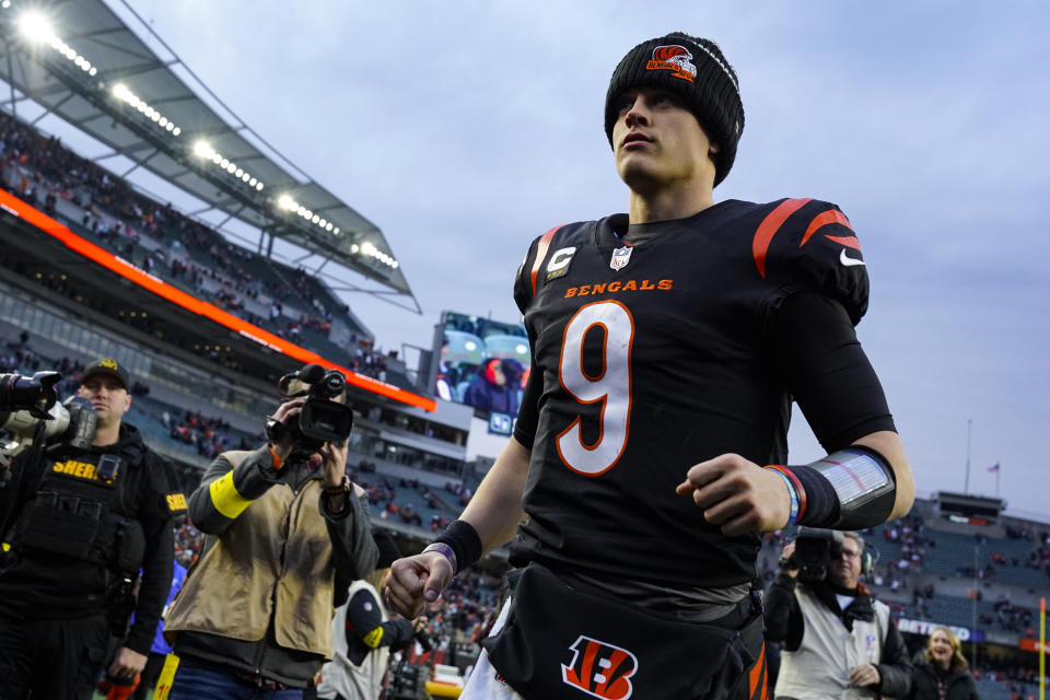 Cincinnati Bengals quarterback Joe Burrow (9) runs off the field following an NFL football game against the Baltimore Ravens in Cincinnati, Sunday, Jan. 8, 2023. The Bengals defeated the Ravens 27-16. (AP Photo/Jeff Dean)