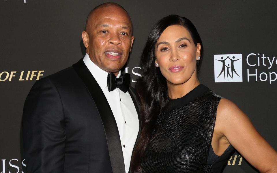 Dr. Dre and Nicole Young - Getty Images