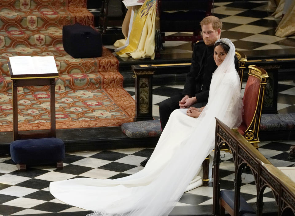 <p>Prince Harry and Meghan Markle during their wedding ceremony in St George’s Chapel at Windsor Castle. (Photo: Owen Humphreys – WPA Pool/Getty Images) </p>