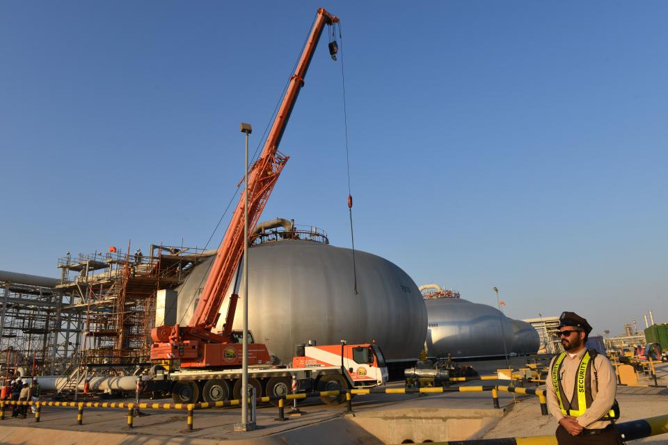 A partial view of Saudi Aramco's Abqaiq oil processing plant on September 20, 2019. - Saudi Arabia said on September 17 its oil output will return to normal by the end of September, seeking to soothe rattled energy markets after attacks on two instillations that slashed its production by half. The strikes on Abqaiq - the world's largest oil processing facility - and the Khurais oil field in eastern Saudi Arabia roiled energy markets and revived fears of a conflict in the tinderbox Gulf region. (Photo by Fayez Nureldine / AFP)        (Photo credit should read FAYEZ NURELDINE/AFP/Getty Images)