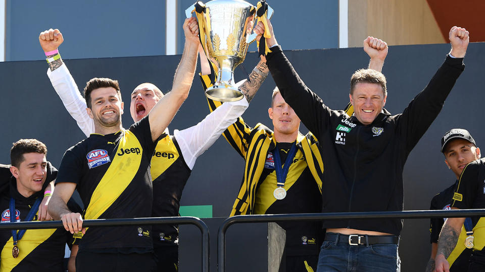 Pictured here, Richmond Tigers celebrate their 2019 AFL premiership win. 