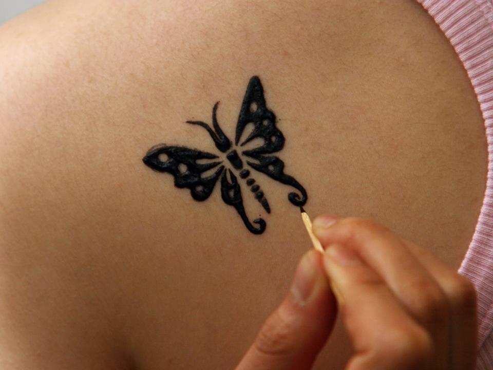 A butterfly tattoo.
