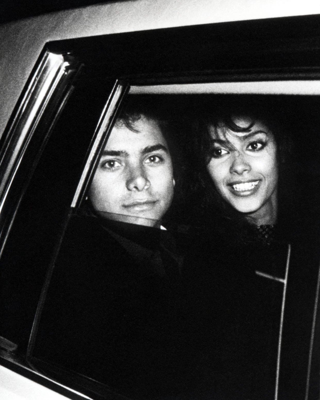 John Stamos and Vanity (Photo by Ron Galella/Ron Galella Collection via Getty Images)