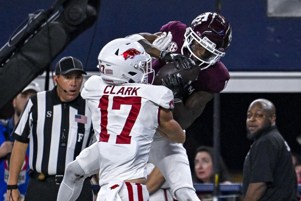 Sep 24, 2022; Arlington, Texas, USA; Arkansas Razorbacks defensive back Hudson Clark (17) defends against a pass to Texas A&M Aggies wide receiver Evan Stewart (1) during the second half at AT&T Stadium. Mandatory Credit: <a class="link " href="https://sports.yahoo.com/ncaaf/players/288763" data-i13n="sec:content-canvas;subsec:anchor_text;elm:context_link" data-ylk="slk:Jerome;sec:content-canvas;subsec:anchor_text;elm:context_link;itc:0">Jerome</a> Miron-USA TODAY Sports