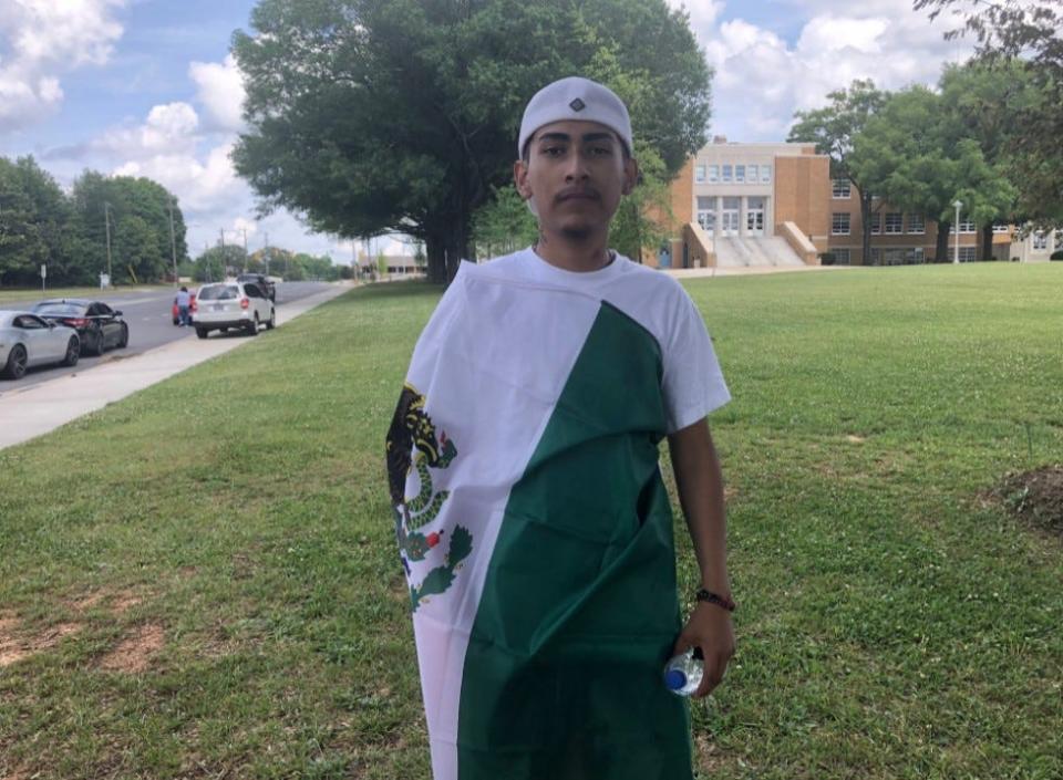 Ever Lopez, 18, says he wore a Mexican flag during graduation ceremonies for his family and to honor his parents who are Mexican immigrants.