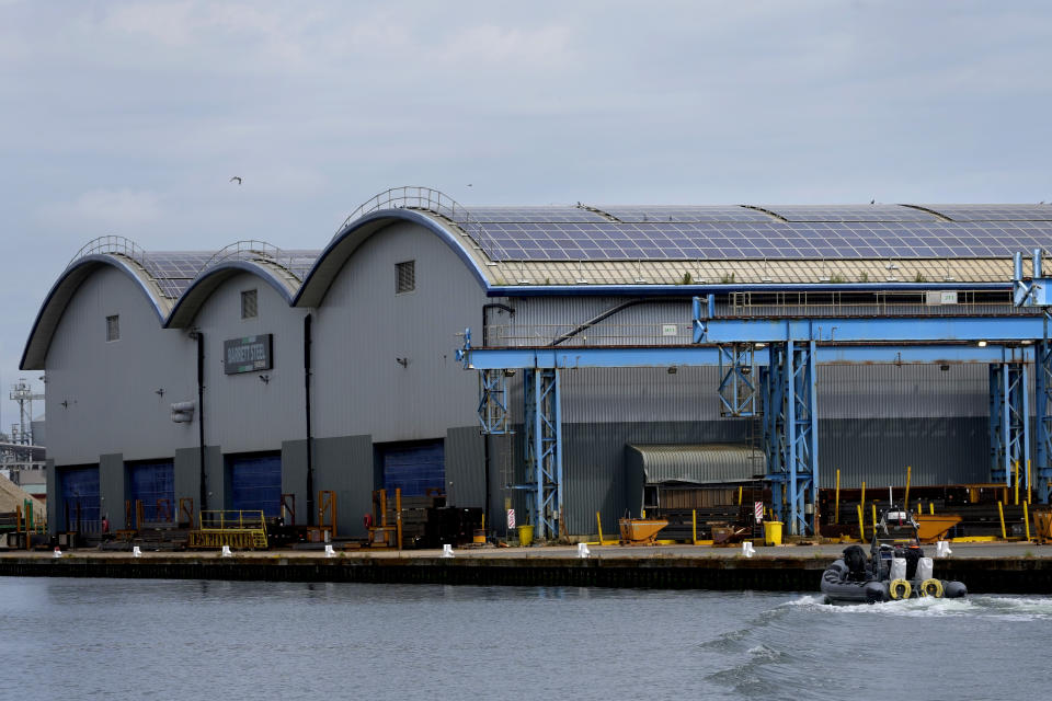 A view of the Barrett Steel factory with solar panels covering the roof in Shoreham Port, East Sussex, England, Wednesday, June 12, 2024. There’s lots of talk of change in Britain’s election campaign, but little talk about climate change. The U.K.’s July 4 vote to choose a new government comes after one of the wettest and warmest winters on record, part of trends scientists attribute to global warming. (AP Photo/Kirsty Wigglesworth)