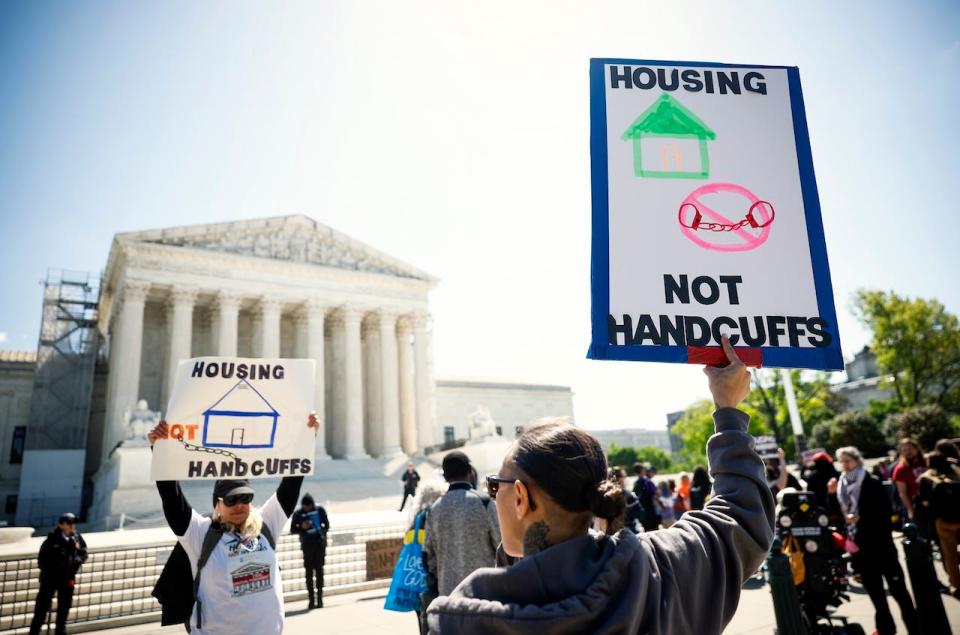 Homeless rights activists held a rally outside the U.S. Supreme Court on the day the court heard oral argument in City of Grants Pass, Oregon v. Johnson.