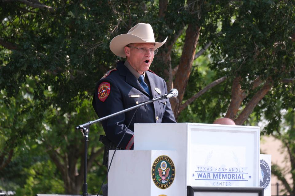 DPS Regional Director Joe Longway speaks to the crowd at a boat dedication ceremony for Trooper Matthew Myrick Friday morning at the Texas Panhandle War Memorial Center in Amarillo.