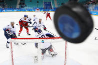 <p>GANGNEUNG, SOUTH KOREA – FEBRUARY 21: Players watch as the puck hits the glass in the first period of the Men’s Play-offs Quarterfinals between the Czech Republic and the United States on day twelve of the PyeongChang 2018 Winter Olympic Games at Gangneung Hockey Centre on February 21, 2018 in Gangneung, South Korea. (Photo by Ronald Martinez/Getty Images) </p>