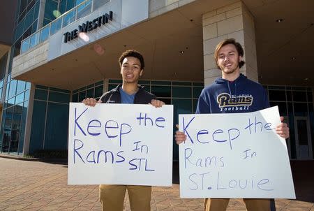 Jan 12, 2016; Houston, TX, USA; St Louis Rams fans hold signs while owners meet at the 2016 NFL owners meeting at the Westin Houston. Mandatory Credit: Thomas B. Shea-USA TODAY Sports