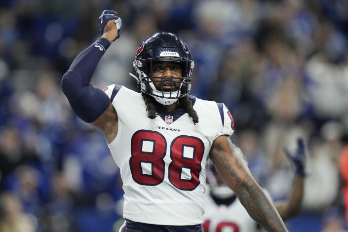 Houston Texans tight end Jordan Akins reacts after scoring on a 28-yard touchdown pass during the second half of an NFL football game between the Houston Texans and Indianapolis Colts, Sunday, Jan. 8, 2023, in Indianapolis. (AP Photo/AJ Mast)
