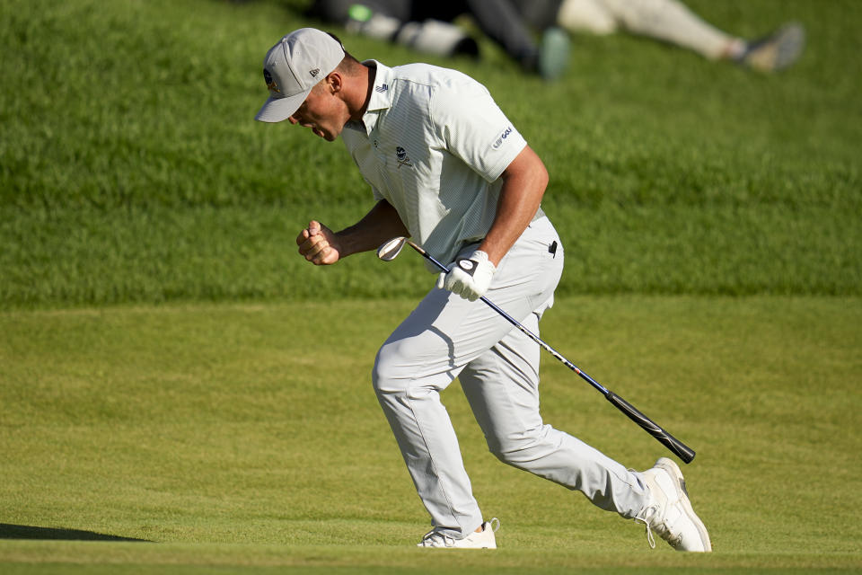 Bryson DeChambeau celebrates after a eagle on the 18th hole during the third round of the PGA Championship golf tournament at the Valhalla Golf Club, Saturday, May 18, 2024, in Louisville, Ky. (AP Photo/Sue Ogrocki)