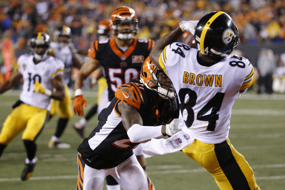 Steelers wideout Antonio Brown caught a touchdown pass and paid for it as he received a head shot from George Iloka (not pictured). The Bengal was suspended for the blow on Tuesday. (AP) 