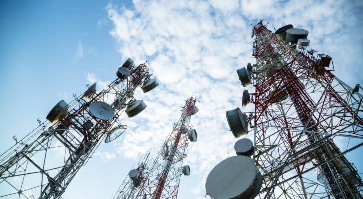 a picture of cell towers during daytime