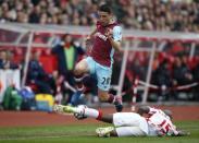 Britain Football Soccer - Stoke City v West Ham United - Premier League - bet365 Stadium - 29/4/17 West Ham United's Jonathan Calleri in action with Stoke City's Bruno Martins Indi Reuters / Andrew Yates Livepic