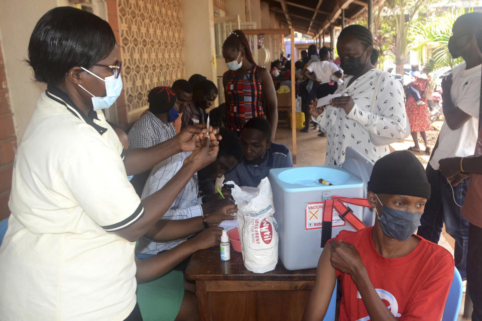 A nurse prepares to administer yellow fever vaccine at Kiswa Health Center III in Kampala, Uganda Tuesday, April 2, 2024. Uganda has rolled out a nationwide yellow fever vaccination campaign to help safeguard its population against the mosquito-borne disease that has long posed a threat. (AP Photo)