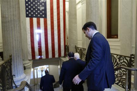 U.S. Senator Marco Rubio (R-FL) (R) departs after a Republican Senate caucus meeting at the U.S. Capitol in Washington, October 16, 2013. REUTERS/Jonathan Ernst