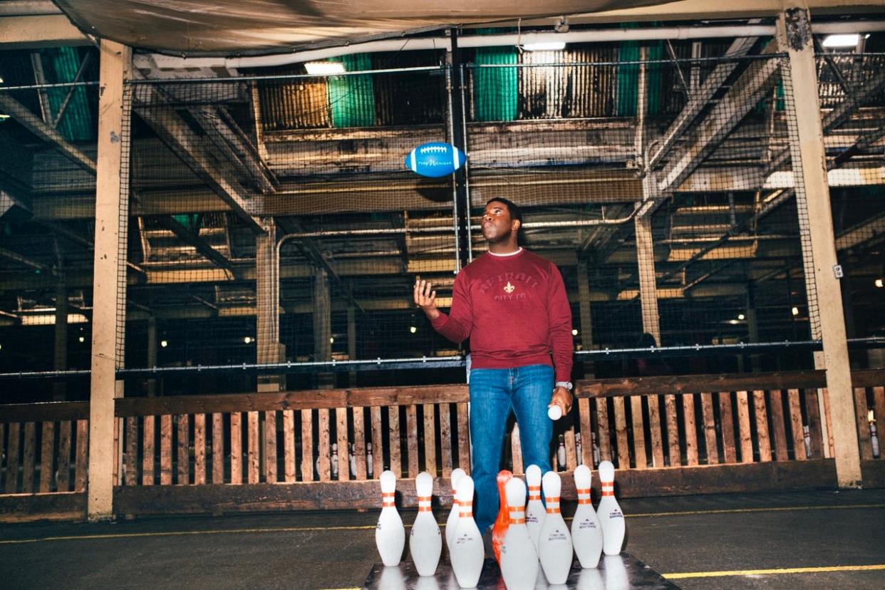 Sam Richardson visits the Fowling Warehouse in Hamtramck to play a football/bowling game, part of a promotional campaign for Detroit in advance of the NFL draft.