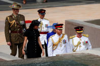 Britain's Prince Harry and Meghan, Duchess of Sussex, arrive for the opening of the enhanced ANZAC memorial in Hyde Park, Sydney, Australia October 20, 2018. REUTERS/Rick Stevens