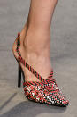 <p><i>Red, black, and white woven heels from the SS18 Altuzarra collection. (Photo: Getty) </i></p>