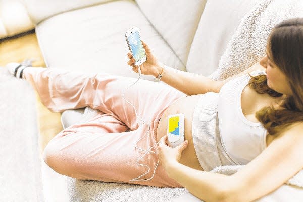 Bellabeat via AP
Bellabeat’s fetal heart listening system includes a heart monitor device that’s plugged into a smartphone’s headphone port. The device comes with an app that tracks the baby’s heart rate and allows the sound to be recorded.