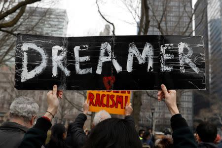 FILE PHOTO: Activists and DACA recipients march up Broadway during the start of their 'Walk to Stay Home,' a five-day 250-mile walk from New York to Washington D.C., to demand that Congress pass a Clean Dream Act, in Manhattan, New York, U.S., February 15, 2018. REUTERS/Shannon Stapleton