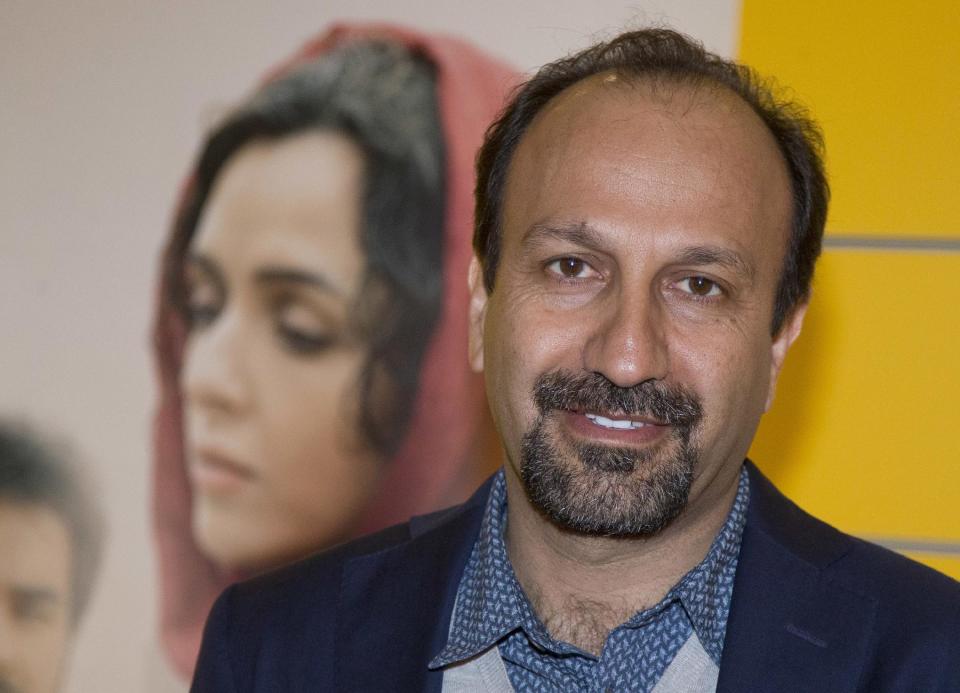 FILE -- In this Oct. 10, 2016 file photo, Iranian director Asghar Farhadi poses for a photo during the premiere of his film, "The Salesman, in Paris. Iran's top diplomat has congratulated director Asghar Farhadi for winning the Oscar in the best foreign language category with his film "the Salesman." Mohammad Javad Zarif saw the prize as a move against President Donald Trump's effort to bar U.S. entry to citizens from seven majority Muslim countries, including Iran. Zarif tweeted: "Proud of Cast and Crew of "The Salesman" for Oscar and stance against #MuslimBan. Iranians have represented culture and civilization for millennia." (AP Photo/Michel Euler, File)