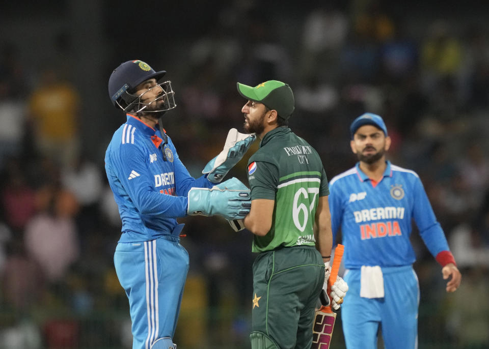 India's KL Rahul attends to Pakistan's Agha Salman after he was hit by a ball during the Asia Cup cricket match between India and Pakistan in Colombo, Sri Lanka on Monday, Sept.11, 2023. (AP Photo/Eranga Jayawardena)