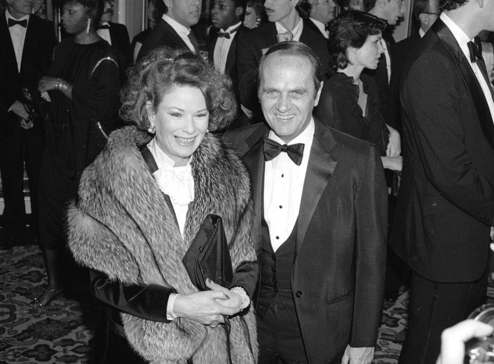 FILE - This Jan. 26, 1985 file photo shows actor-comedian Bob Newhart, right and his wife Ginny at the Golden Globe Awards in Beverly Hills, Calif. Newhart is celebrating his 90th birthday on Thursday, and he’s got big plans: spending the day with his wife of 56 years, Ginnie, and their children. The comedian and actor said he considers laughter the key to longevity in marriage and in life. (AP Photo/Lennox McLendon, File)