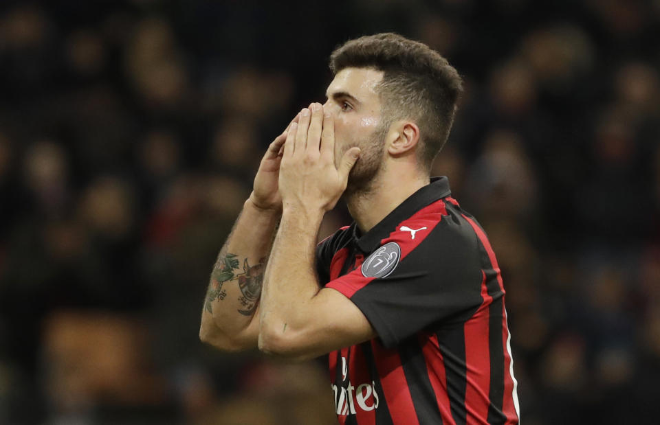 AC Milan's Patrick Cutrone gestures after missing a scoring chance during a Serie A soccer match between AC Milan and Torino , at the San Siro stadium in Milan, Italy, Sunday, Dec. 9, 2018. (AP Photo/Luca Bruno)