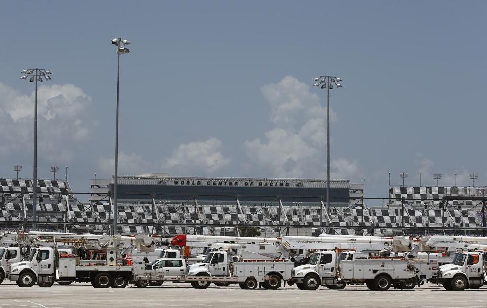 In this file photo, power crews stage at FPL Staging site at Daytona International Speedway in Daytona Beach, Saturday, Aug. 1, 2020.