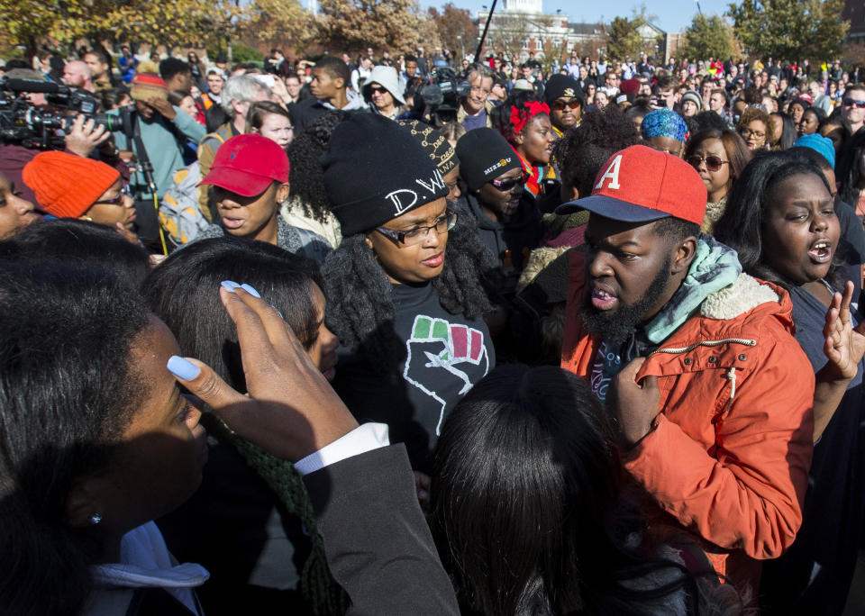 COLUMBIA, MO - NOVEMBER 9:  Members of Concerned Student 1950 celebrate after the resignation of Missouri University president Timothy M. Wolfe on the Missouri University Campus November 9, 2015 in Columbia, Missouri. Wolfe resigned after pressure from students and student athletes over his perceived insensitivity to racism on the university campus.  (Photo by Brian Davidson/Getty Images)