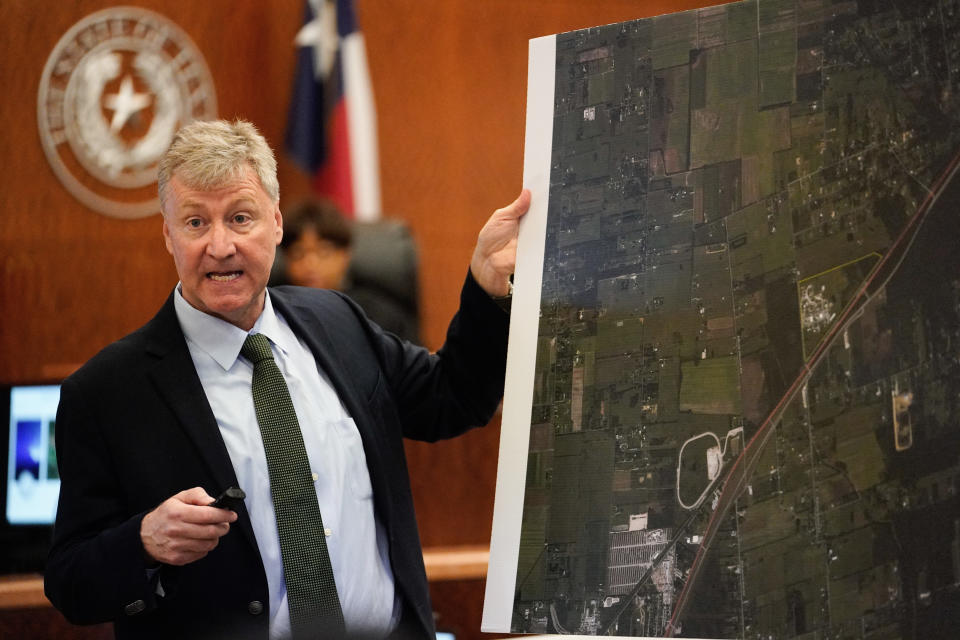 Special prosecutor Michael Doyle speaks during opening statements during the Arkema Inc. criminal trial at Harris County Criminal Courthouse Thursday, Feb. 27, 2020, in Houston. Arkema Inc., a subsidiary of a French chemical manufacturer, along with three senior staff members are on trial over a fire at the Houston-area chemical plant that was overwhelmed by Hurricane Harvey's flooding in 2017. (Melissa Phillip/Houston Chronicle via AP)