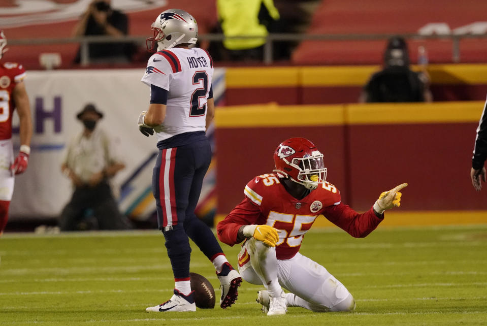 Kansas City Chiefs defensive end Frank Clark (55) celebrates after sacking New England Patriots quarterback Brian Hoyer (2) during the first half of an NFL football game, Monday, Oct. 5, 2020, in Kansas City. (AP Photo/Charlie Riedel)