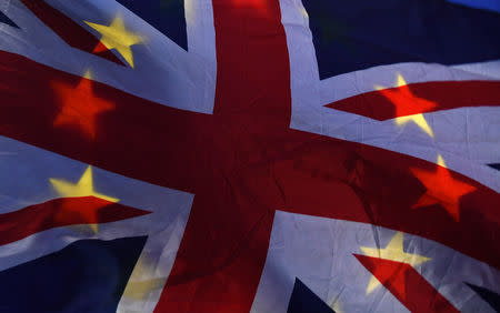 A flag depicting the British Union Jack design and the EU design is seen outside of the Houses of Parliament in London, Britain, January 14, 2019. REUTERS/Clodagh Kilcoyne