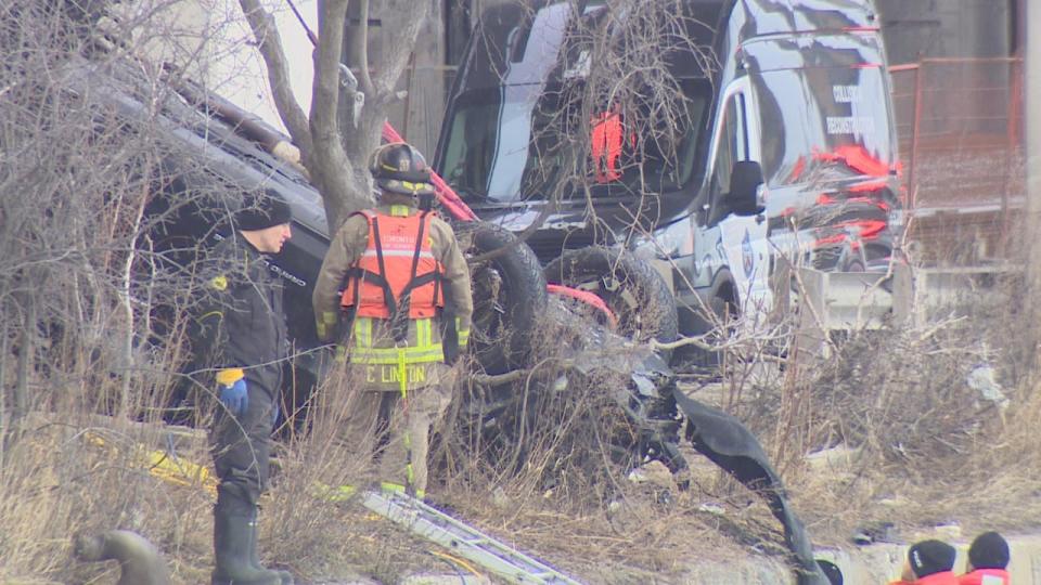 Toronto police and Toronto Fire are seen near Lakeshore Boulevard and Cherry Street extracting a vehicle that crashed into Lake Ontario Saturday morning.