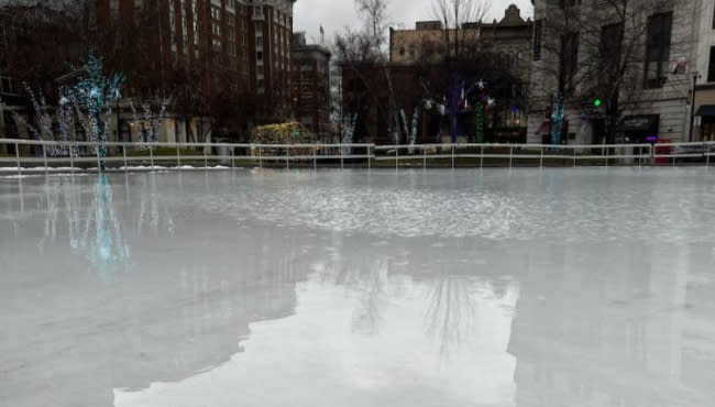 Warm temperatures make for a watery ice rink at Rosa Parks Circle in Grand Rapids on Feb. 9, 2023.