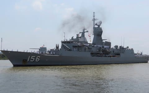 Royal Australian Navy frigate HMAS Toowoomba prepares to dock at Saigon port in Ho Chi Minh City, Vietnam after reports that three ships were challenged by China in the South China Sea - Credit:  Van Khoa/ Thanh Nien News